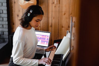 Young Woman Playing Piano